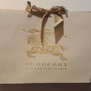 Authentic Burberry shopping bag with matching gold tone ribbon tie